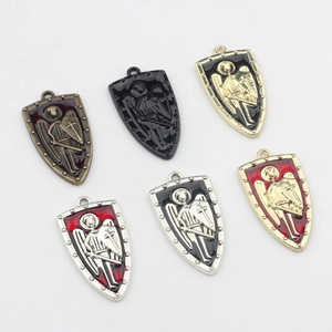 Shield-shaped alloy pendant with St. Michael relief and enamel oil in multiple metallic colors