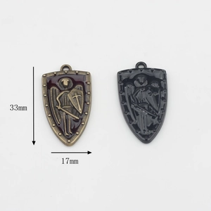 Gothic shield pendant in bronze and black alloy featuring relief knight engraving