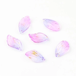 Détail de perles en verre iris avec dégradé rose-violet et feuille d'or pour bricolage