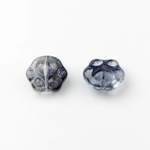 Macro shot of gray-blue crystal glass cat paw loose beads for DIY jewelry making