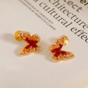Boucles d'oreilles clips papillon dorées avec cristaux dégradés rouges et strass chic