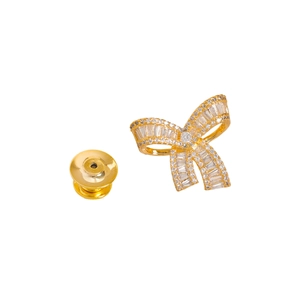 Elegant gold bow brooch with sparkling cubic zirconia stones and matching butterfly clasp