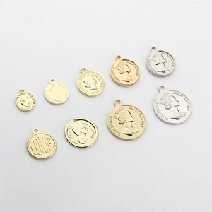 Vintage alloy Queen Elizabeth II coin charms set in gold, silver, and rose gold finishes