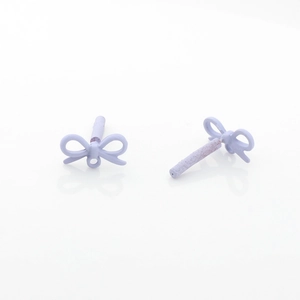 Macro detail of matte light purple bow stud earrings for DIY jewelry making