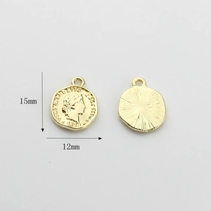 Detailed view of vintage gold coin pendants showing 15mm by 12mm dimensions and relief