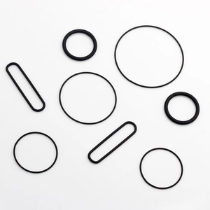 Assorted black rubber O-rings and oval seals in various sizes for industrial DIY use