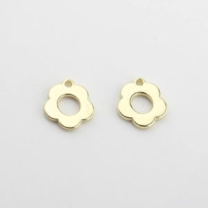 Detailed view of hollow plum blossom charms for DIY necklaces and bracelets