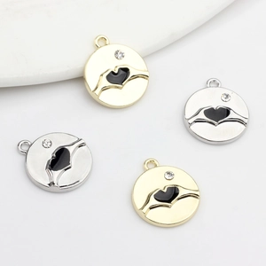 Round alloy heart gesture charms with black enamel and zircon inlay in gold and silver