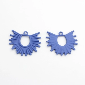 Macro view of matte lilac fan-shaped geometric alloy charms with SW engraved on back