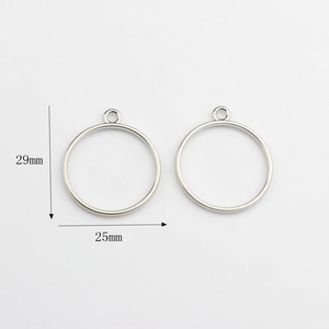 Détail de breloques rondes de 25mm en alliage pour boucles d'oreilles DIY de 29mm