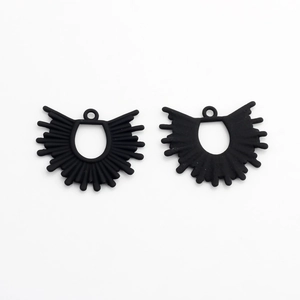 Detail of matte black sunburst fan pendants with hollow ribs and top loop for DIY jewelry