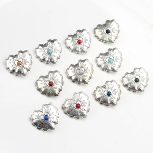 Detailed view of vintage alloy heart-shaped buttons with lace edge and colorful beads