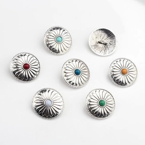 Detail of vintage silver sunflower buttons with colorful stone inlay and sewing loops