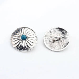 Close-up of vintage sunflower alloy buttons with blue turquoise center and back loop