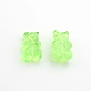 Front and back macro view of fluorescent green bear acrylic beads with center hole