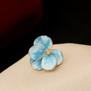 Elegant blue enamel iris flower brooch with gold edges and zircon center for women