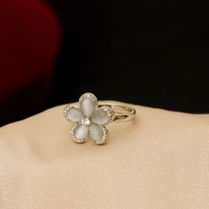 Elegant opal flower open ring with sparkling cubic zirconia on a silk base
