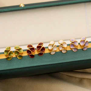 Enamel cream flower clip-on earrings in green, red, white and purple colors
