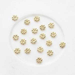 Golden flower-shaped spacer beads in 14K gold plated copper for DIY jewelry making