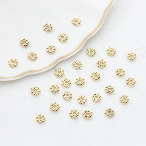 Polished 14K gold plated snowflake spacer beads for handmade jewelry making and crafts
