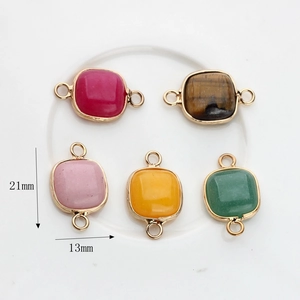 Square natural stone charms in gold plated settings showing 21mm x 13mm dimensions