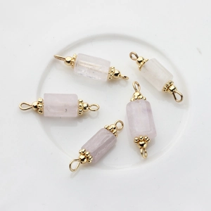 Detail view of 14K gold plated natural pink quartz pendants for DIY jewelry earrings