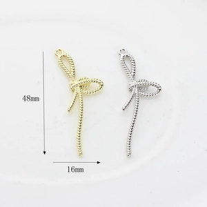 Pendentif nœud minimaliste en or et argent pour bijoux DIY, dimensions 48mm x 16mm