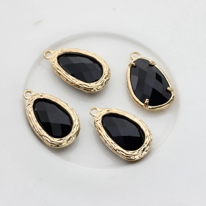 Set of four 14K gold-plated teardrop charms with faceted black glass for jewelry making