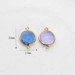 17mm round faceted crystal pendant with gold-plated copper trim and double loops