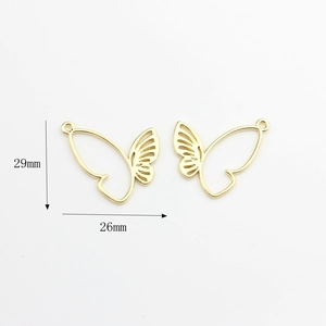 Detailed view of hollow butterfly charms with 29mm by 26mm size measurements