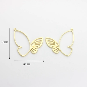 Detailed view of hollow butterfly wing jewelry charms with 38mm by 34mm measurements