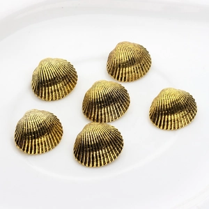 Set of 6 vintage gold scallop shell metal charms with textured radial patterns for DIY jewelry
