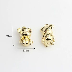 Detailed view of 21mm gold bear charms showing front and side profile for DIY jewelry