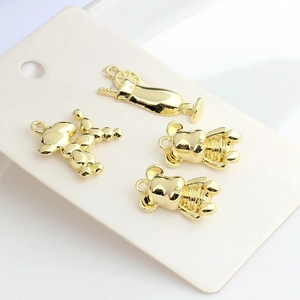 Golden alloy charm set with cocktail, balloon dog, and bear shapes for DIY jewelry making