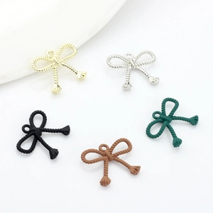 Five assorted colors of bowknot alloy pendants with rope texture for DIY jewelry making