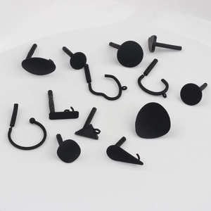 Detailed assortment of matte black geometric charms and hooks for DIY jewelry making