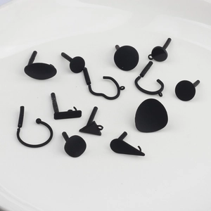 Matte black geometric earrings components including studs, hooks and teardrop shapes