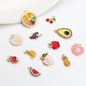 Close-up of colorful alloy enamel fruit charms for DIY bracelets and jewelry making