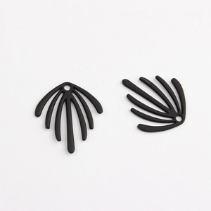 Detailed view of black fan-shaped alloy charms with radial lines for DIY earring making