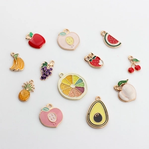 Assorted colorful enamel fruit charms including apple and banana for DIY jewelry making