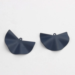 Close-up of matte dark blue semi-circle fan pendants with rings for DIY earring making
