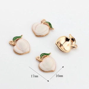 Detail showing 4 peach-shaped enamel charms for DIY jewelry with 17mm x 16mm dimensions