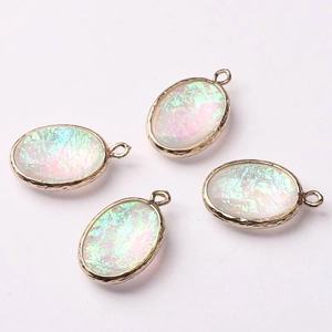 Oval pendants with gold metal edges and iridescent centers for DIY jewelry making