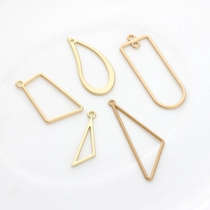 Set of five gold geometric alloy pendants for DIY jewelry earring making projects