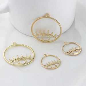 Pendentifs œil évidés dorés de tailles variées pour la création de bijoux DIY