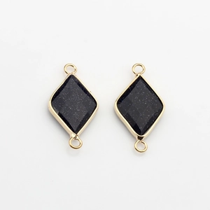 Detail of gold-plated rhombus connector charms with blue sandstone for jewelry making