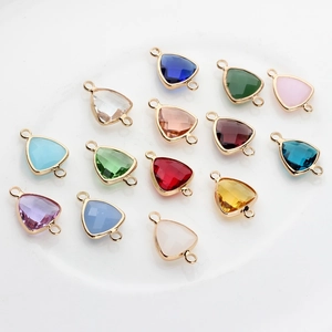 Triangle faceted crystal pendants with gold copper edges and dual hanging loops for jewelry