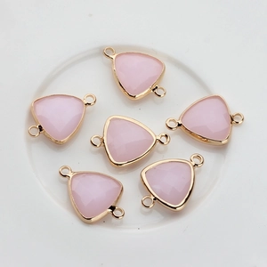 Pink triangular crystal charms with gold-plated copper edges and double hanging loops