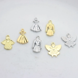 Set of 7 alloy angel and dress charms in gold and silver finish for jewelry making