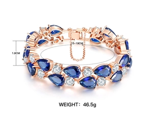 Rose gold zircon bracelet detail showing dimensions 15-19cm and teardrop blue stones
